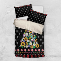 Black bedding set with pillowcases; peace-sign Christmas tree surrounded by colorful flowers.