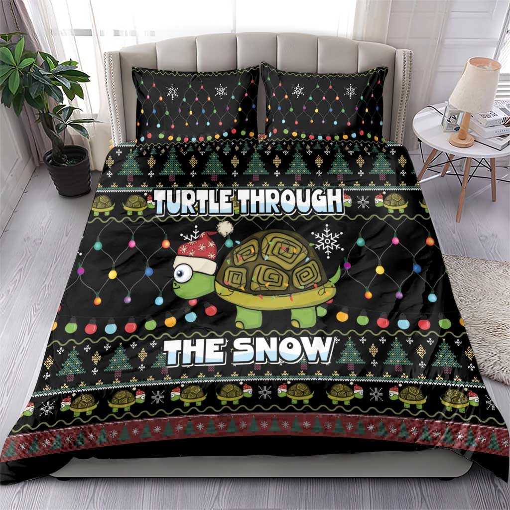Black duvet and pillow set featuring turtle “TURTLE THROUGH” and “THE SNOW” text