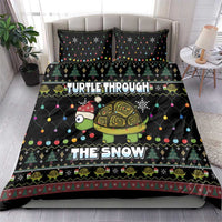 Black duvet and pillow set featuring turtle “TURTLE THROUGH” and “THE SNOW” text