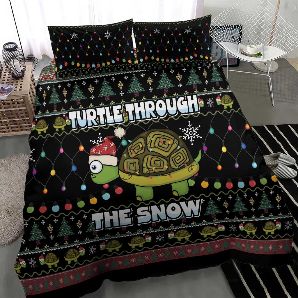 Black Christmas bedding with turtle graphic, snowflakes, and “THE SNOW” centered text