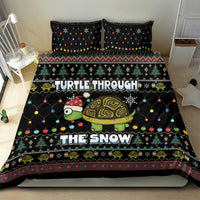 Black bedding set with turtle wearing a hat and “TURTLE THROUGH THE SNOW” design