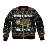 Unisex black bomber jacket with festive turtle graphic, full-zip front and ribbed trim