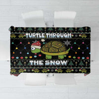 Black Christmas tablecloth with turtle and 'snow' graphic, colorful lights and snowflakes