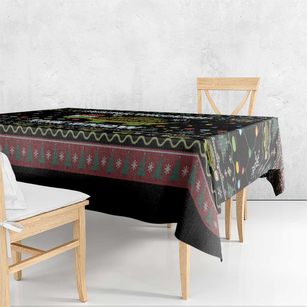 Black Christmas tablecloth with red tree stripe and turtle-themed multicolor border