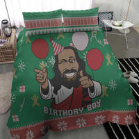 Green duvet and pillowcases featuring cartoon Jesus with holiday icons and “Birthday Boy”.