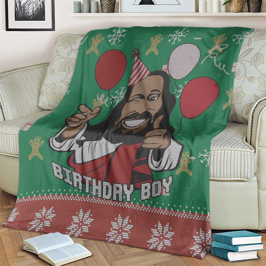 Green blanket with cartoon Jesus portrait, balloons, and red snowflake border