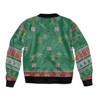 Green bomber jacket with ribbed collar and all-over back holiday pattern