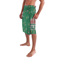 Green African lavalava wrap skirt with reindeer and house print, angled front drape