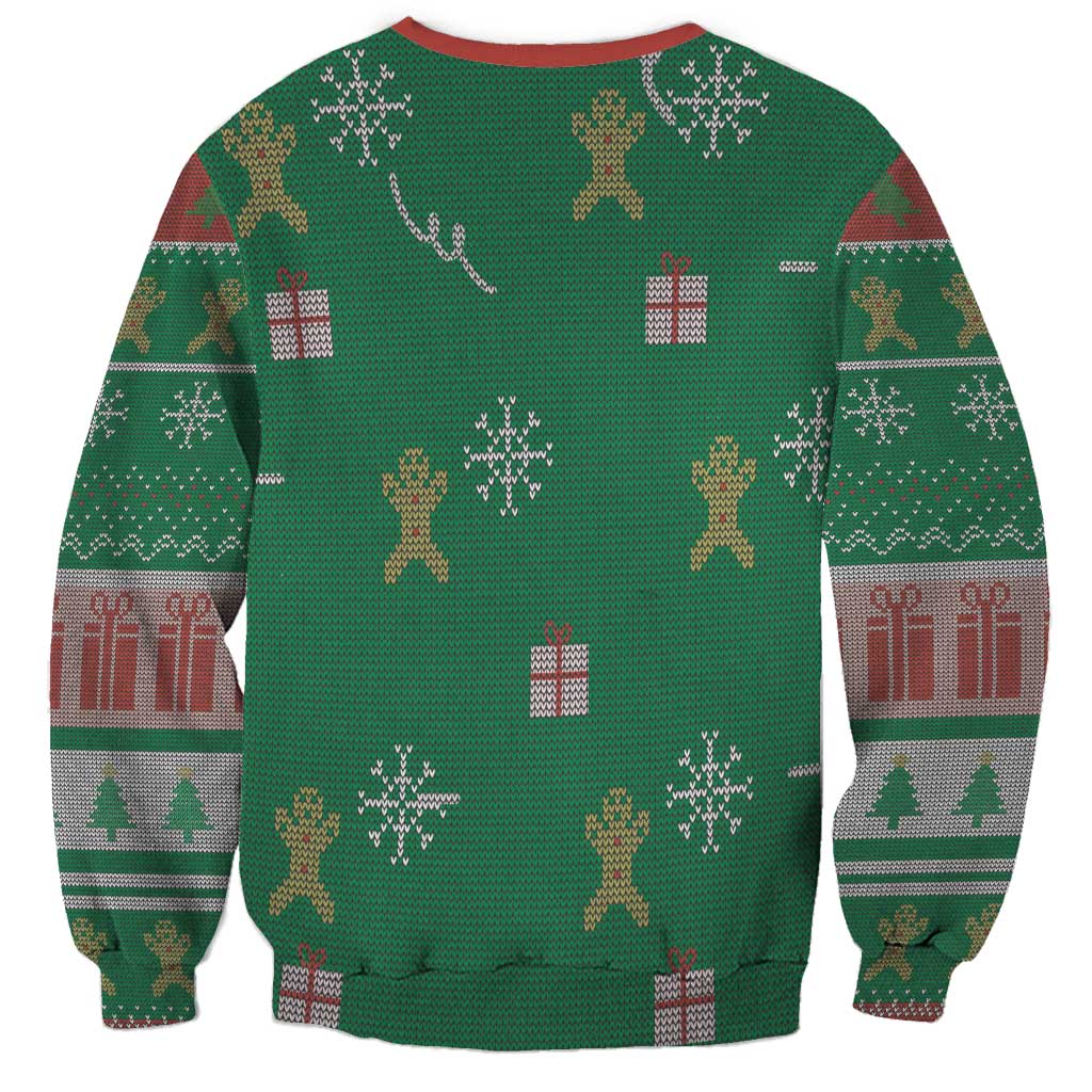 Green unisex sweatshirt with all-over Christmas pattern: gifts, trees, and figures