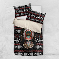 Black duvet cover and pillowcases with skull headdress artwork, white crosses, red motifs