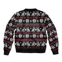 Black bomber jacket with repeating skull pattern and red/white tribal border on back