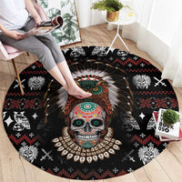 Black round rug viewed from above, skull artwork with green and orange owl headdress