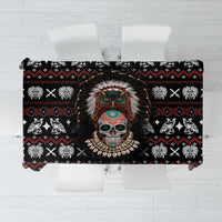 Black tablecloth with red and white tribal skull and cross pattern, centered design