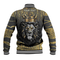 Dark gray baseball jacket back with gold crown, roaring lion, YOURTEXT patch, striped rib trim