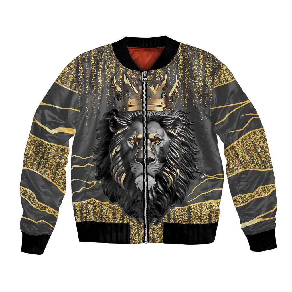 Dark gray bomber jacket with gold lion face graphic, black ribbed cuffs and hem