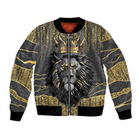 Dark gray bomber jacket with gold lion face graphic, black ribbed cuffs and hem