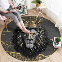 Round dark gray lion carpet with gold lion face and crown, splatter accents