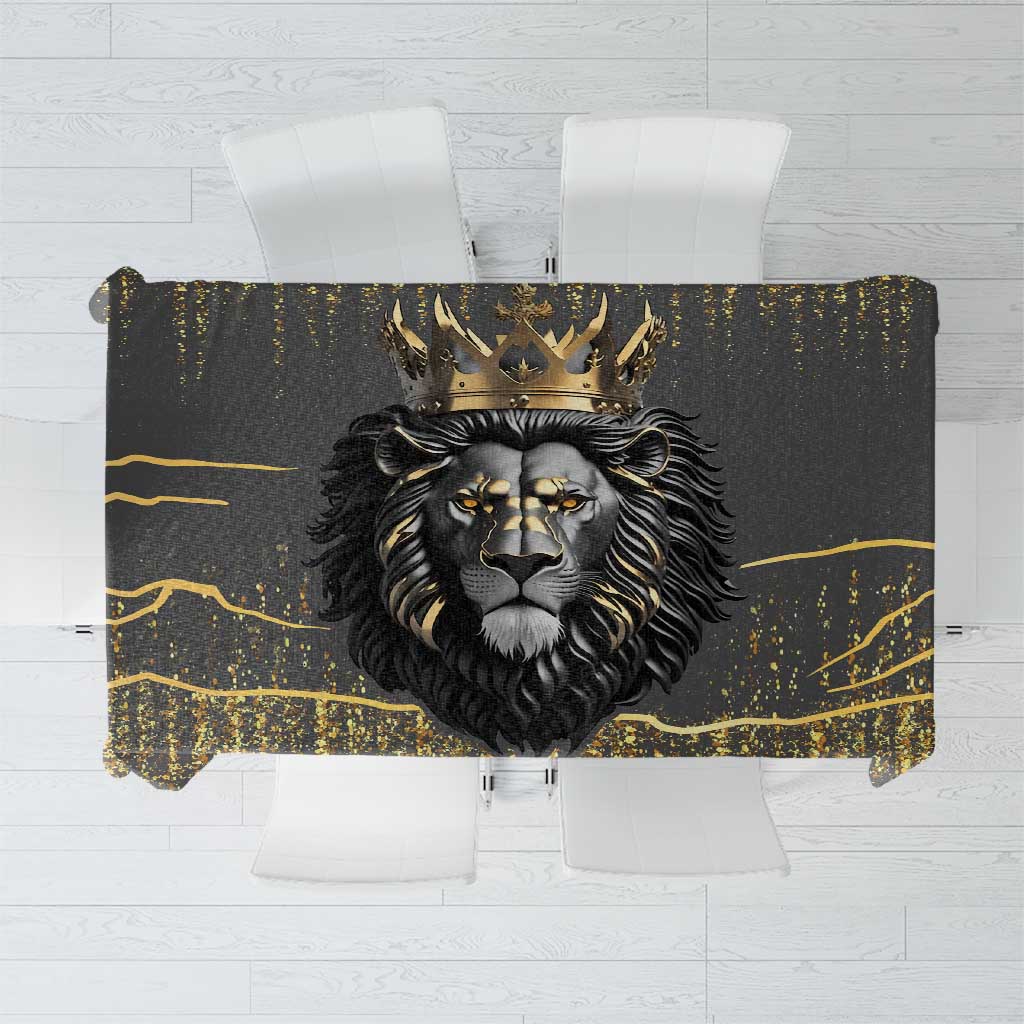 Black and gold lion head tablecloth with gold geometric accents and speckled pattern