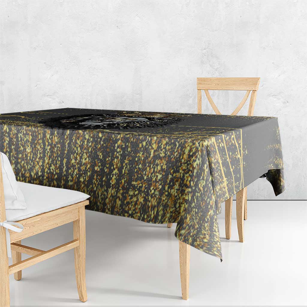 Black and gold lion tablecloth corner detail with gold line frame and speckles