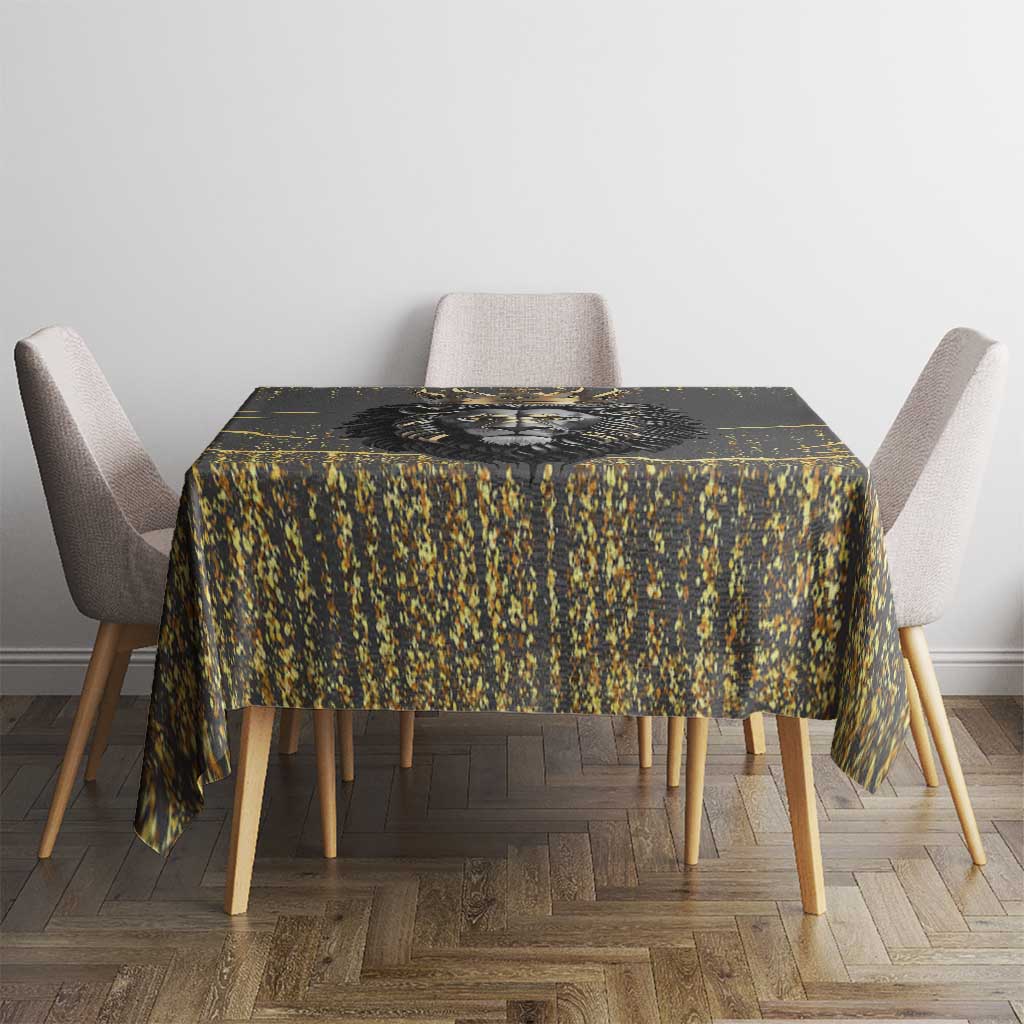 Black and gold lion tablecloth on round table with speckled gold pattern