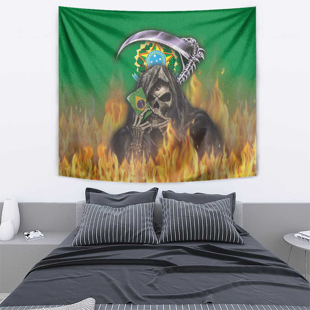 Green tapestry wall hanging showing grim reaper skull, Brazilian flag shield, burning flames