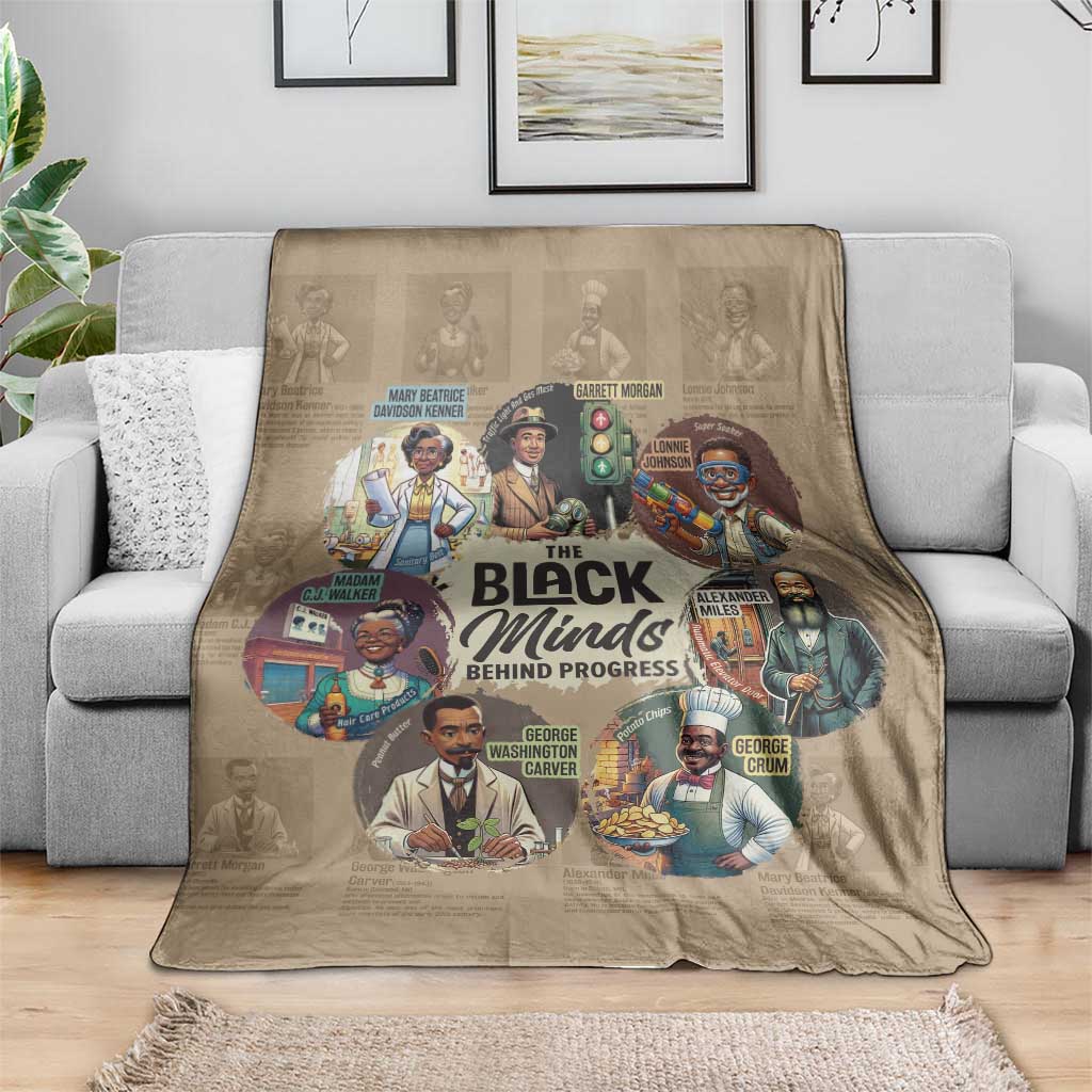 Beige throw blanket on gray sofa, colorful portraits in center design