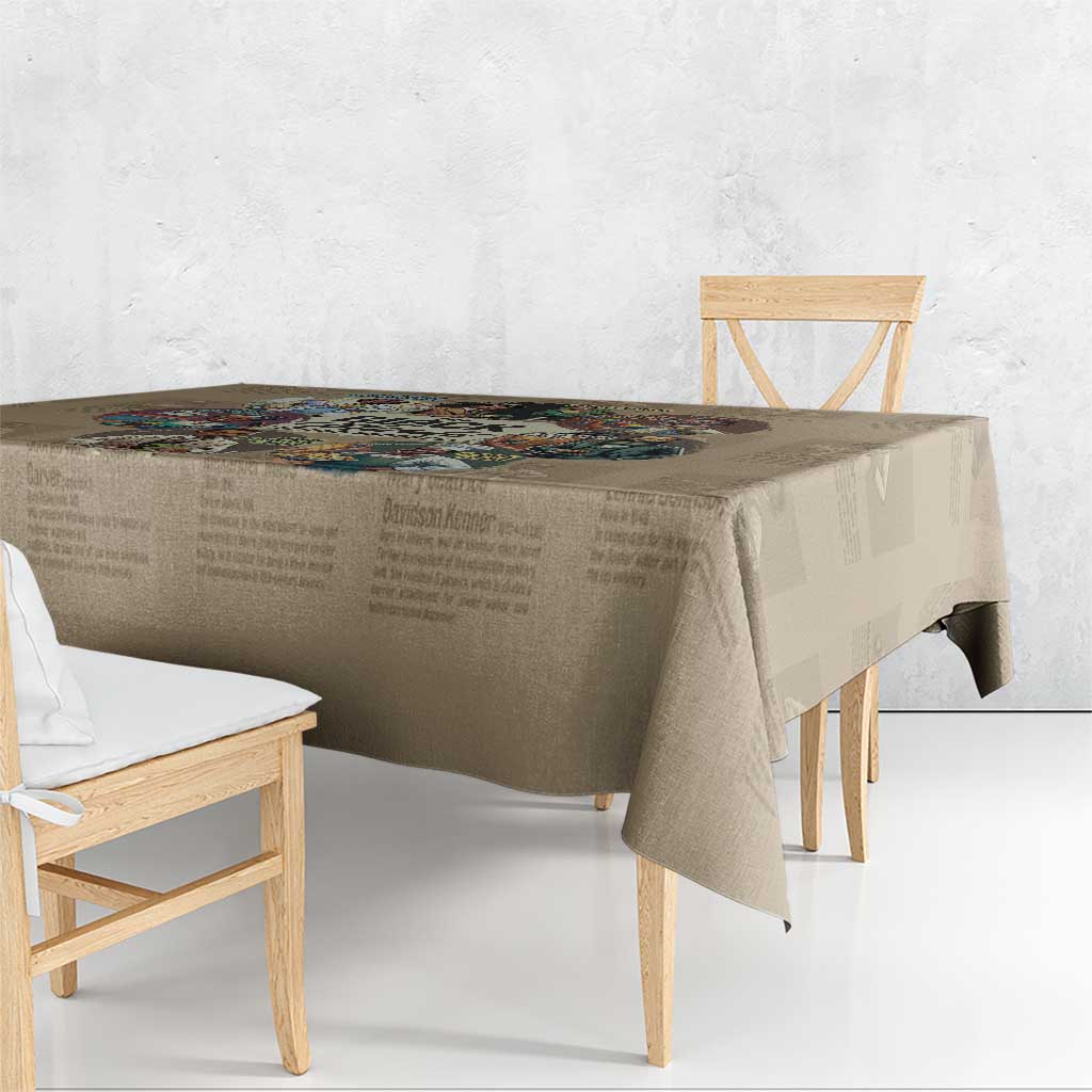 Beige tablecloth draped over table with full-color printed strip along the top edge.