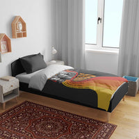 Black bedding set with gray pillows and civil rights leaders “Progress” graphic duvet