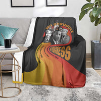 Black blanket with leaders portrait collage and “No Struggle” text over red yellow design