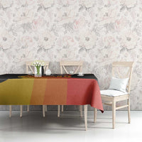 Black tablecloth with multicolor panel stripes and Civil Rights leaders motif on table