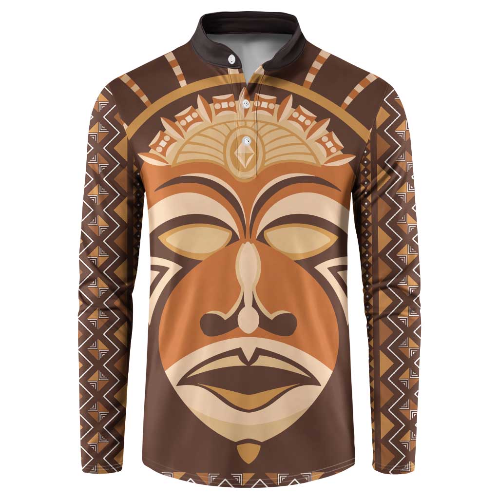 Brown long-sleeve button sweatshirt with printed tribal face mask design and trim details