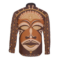 Brown long-sleeve shirt with large tribal face print on back