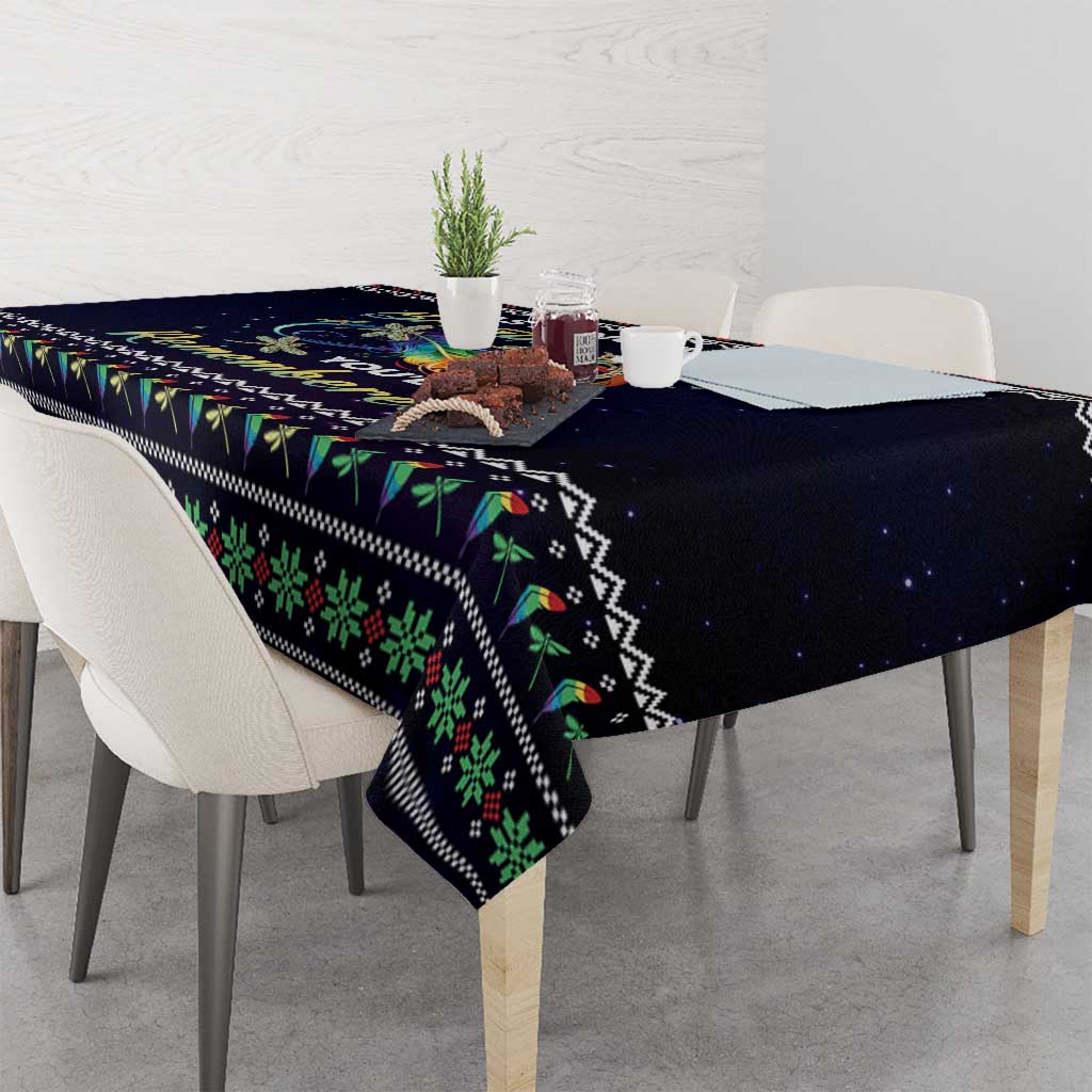 Rectangular tablecloth in dark navy/black with green red trim and angel dragonfly artwork