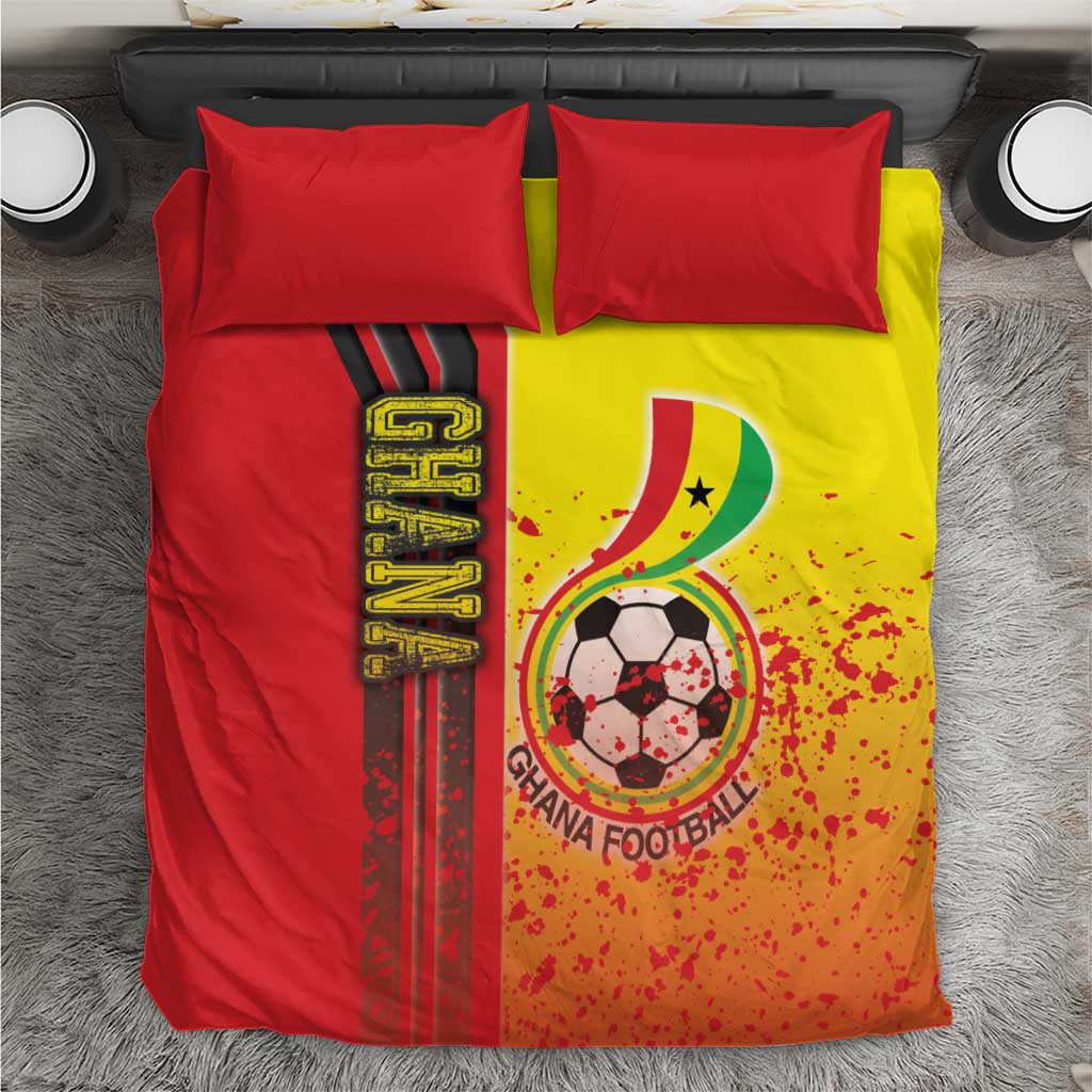 Football-themed bedding set with red and yellow duvet, soccer emblem, black striped panel, 2 red pillows