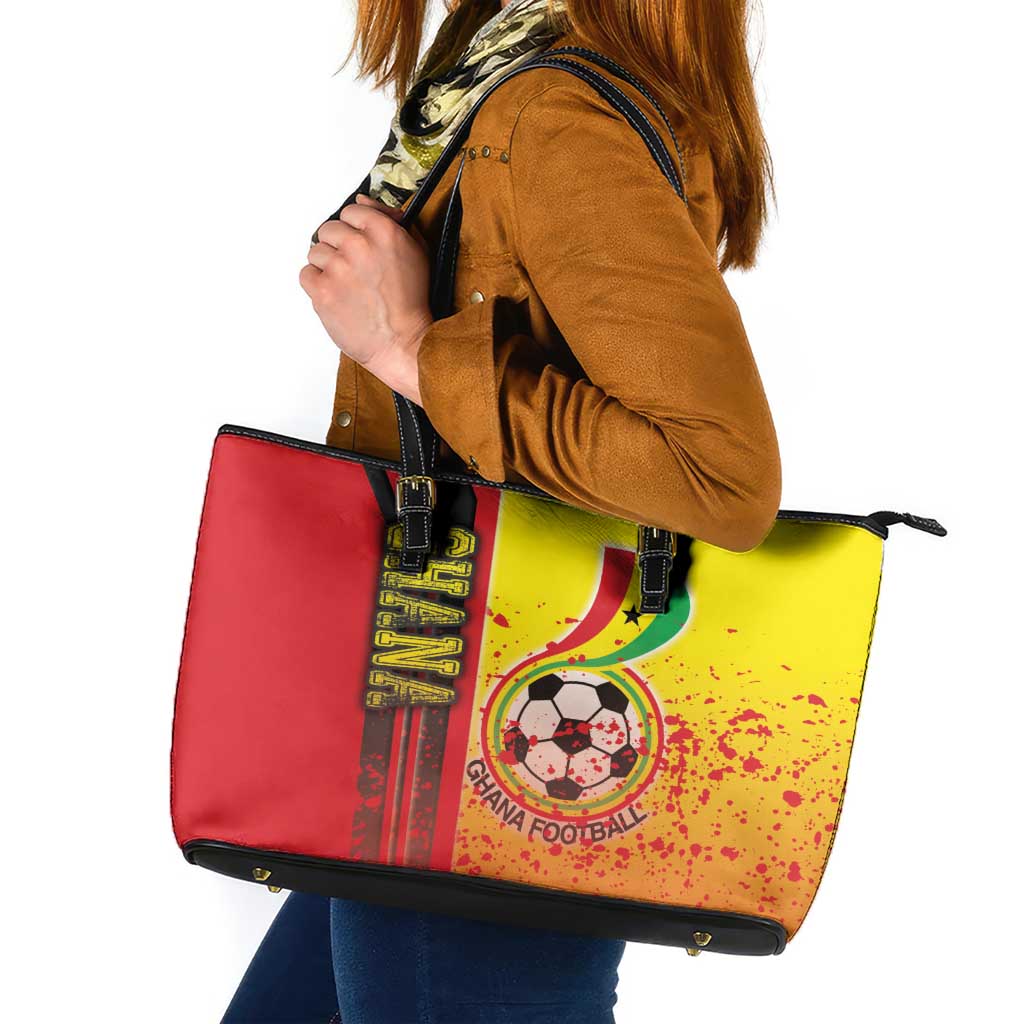 Football tote bag with red, yellow, and black graphic front, top handles and zipper