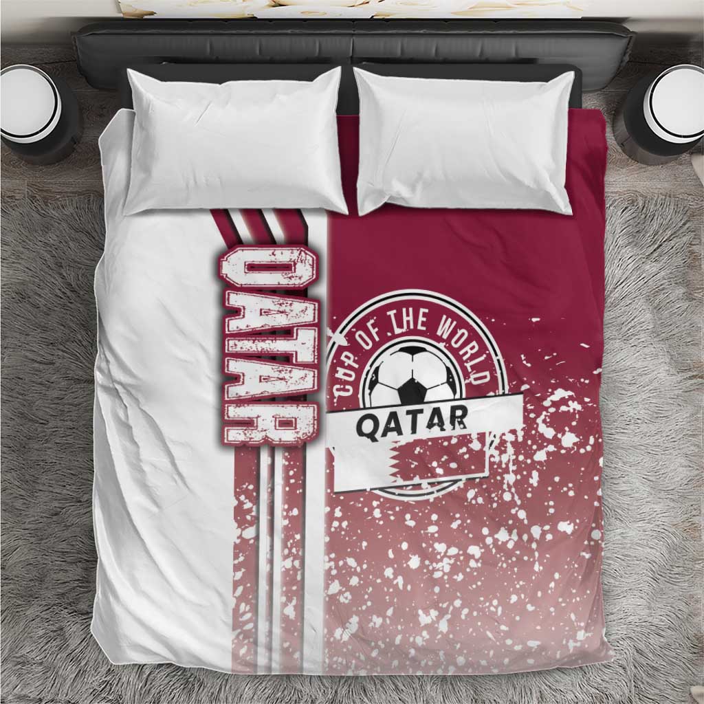 Purple and white football-themed bedding set with Qatar crest and striped graphic on duvet