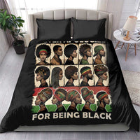 Black bedding set featuring illustrated faces with “FOR BEING BLACK” text on duvet and two pillows