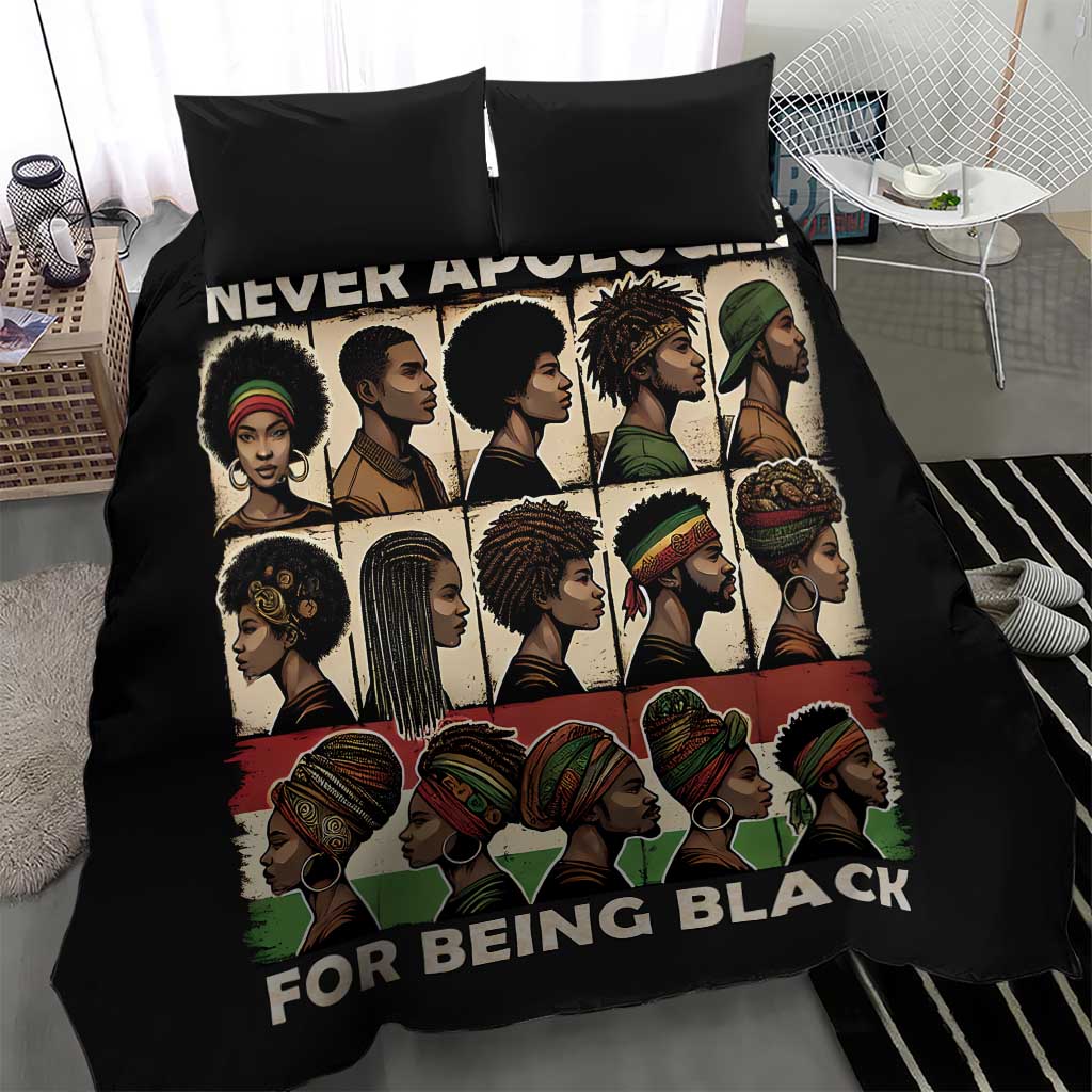 Black bedding set with “NEVER APOLOGIZE” and “FOR BEING BLACK” text on duvet, plus two pillows