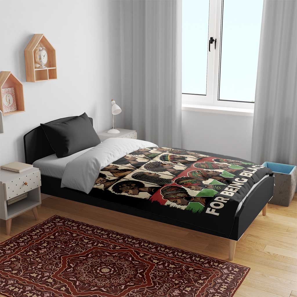 Black bedding set with illustrated faces and “FOR BEING BLACK” text on duvet, one black pillow