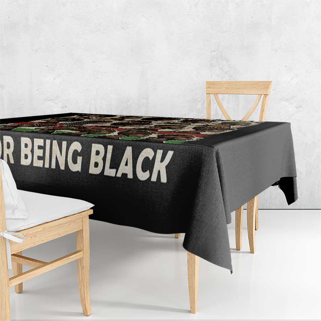 Black tablecloth with 'FOR BEING BLACK' text along the front edge
