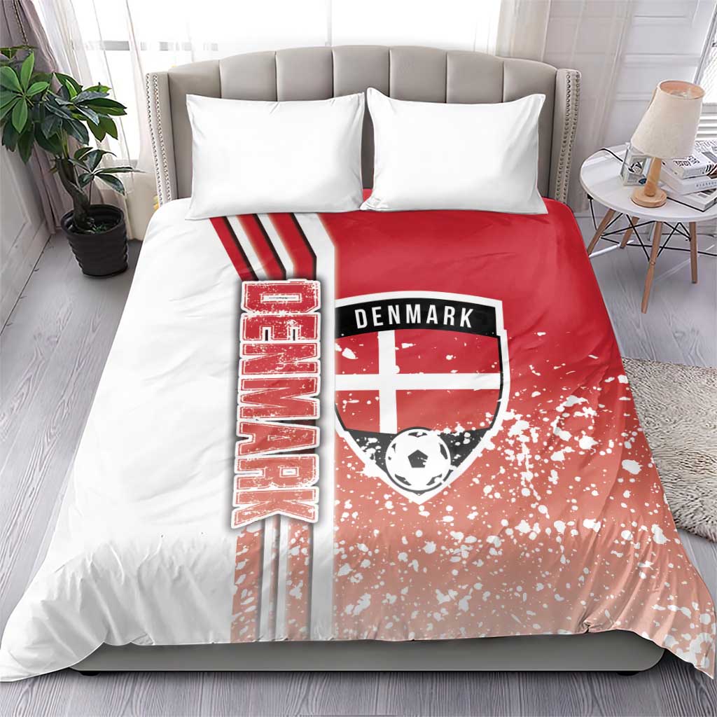 Red football bedding set with Denmark crest, soccer ball, and vertical stripe text on duvet