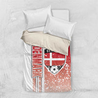 Red football bedding set with Denmark crest, soccer ball, and vertical word graphic on duvet