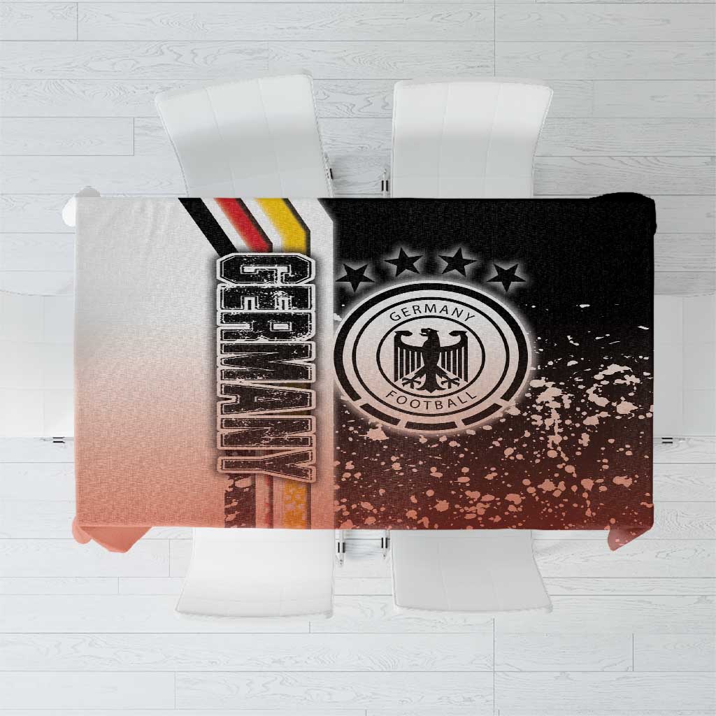Black and rust-red soccer tablecloth with Germany crest and star graphic