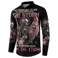 Black sweatshirt with central skull, winged artwork, pink roses, and long sleeve print