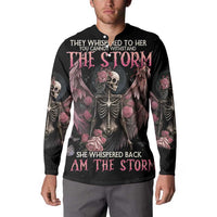 Black sweatshirt on model with skull-and-wings front art, roses, and ribcage skeleton