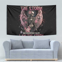Black tapestry featuring a winged skeleton holding roses, with pink floral details