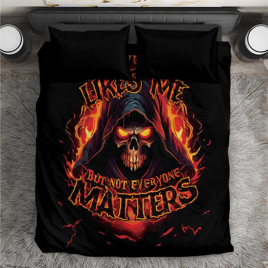 Black bedding set with reaper skull graphic and fiery text on duvet, matching pillowcases