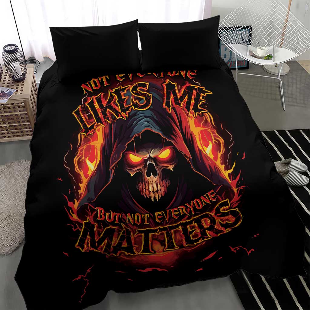 Black bedding set duvet with flaming skull and fiery typography, with two matching pillow covers