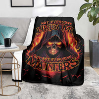 Black skull reaper graphic blanket with flaming skull and glowing red-orange lettering