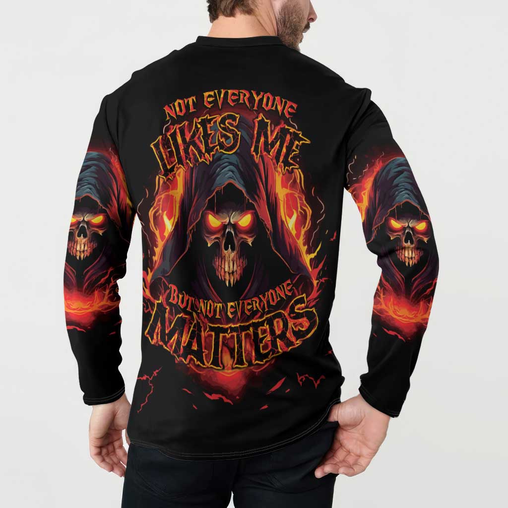 Black skull reaper graphic button sweatshirt on model, long sleeves, back skull flame print